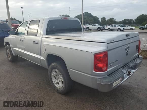2006 Dodge Dakota SLT z VIN 1D7HE48N26S664461, wystawiony jako Copart lot #75167334 z przebiegiem 93 432 mil mil oraz Nie do naprawy • Non repairable. Historia ofert i sprzedaży dostępna na DreamBid. Obrazek 2.