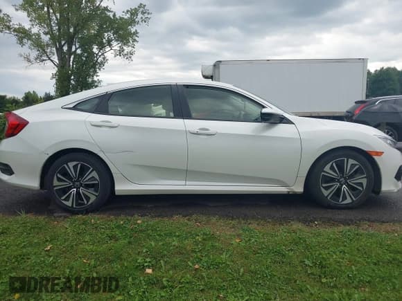 ✅ 2018 Honda Civic EX-T • VIN: JHMFC1F3XJX002306 • Lot: 43149201. Listed on IAAI with 77,470 mi. Free auction sales archive from the USA and detailed vehicle history report at DreamBid. Image 13.