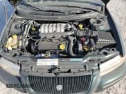 ✅ 1998 Chrysler Cirrus LXi • VIN: 1C3EJ56H2WN272336 • Лот: 77888044. Опубликован ранее на Copart с пробегом 64 757 миль. Бесплатный доступ к архиву аукционных продаж из США и подробный отчёт об истории автомобиля на DreamBid. Изображение 11.