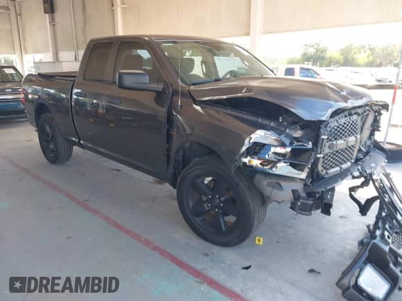 2018 Ram 1500 Tradesman z VIN 1C6RR6FT3JS244868, wystawiony jako IAAI lot #42310301 z przebiegiem 115 764 mil mil oraz . Historia ofert i sprzedaży dostępna na DreamBid. Obrazek 1.