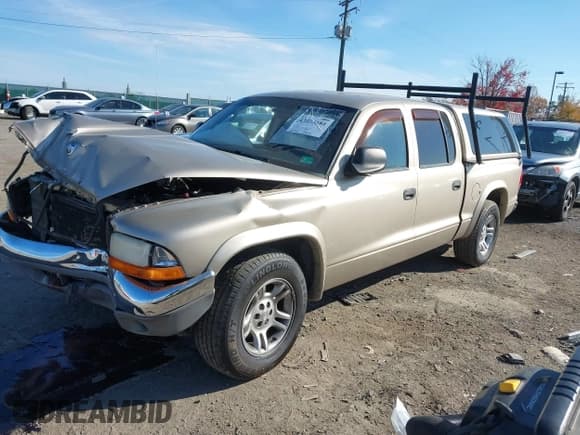 ✅ 2004 Dodge Dakota SLT • VIN: 1D7HL48N14S682517 • Lot: 43673584. Listed on IAAI with 169,891 mi. Free auction sales archive from the USA and detailed vehicle history report at DreamBid. Image 2.