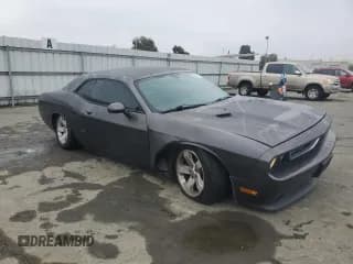 ✅ 2014 Dodge Challenger SXT 100th Anniversary • VIN: 2C3CDYAG9EH153155 • Lot: 85796844. Wystawiony na Copart z przebiegiem 124 262 mil. Bezpłatny archiwum sprzedaży aukcyjnych z USA i szczegółowy raport historii pojazdu na DreamBid. Zdjęcie 4.