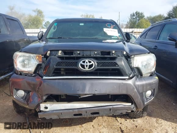 ✅ 2015 Toyota Tacoma • VIN: 5TFLU4EN8FX119895 • Lot: 43670596. Listed on IAAI with 185,866 mi. Free auction sales archive from the USA and detailed vehicle history report at DreamBid. Image 12.