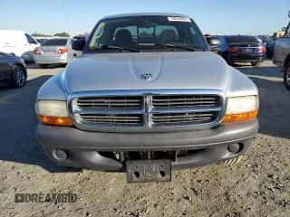 2004 Dodge Dakota z VIN 1D7GL12K64S533612, wystawiony jako Copart lot #79676404 z przebiegiem 102 575 mil mil oraz Czysty tytuł • Clean title. Historia ofert i sprzedaży dostępna na DreamBid. Obrazek 5.