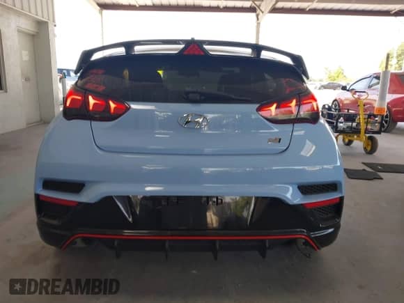 2020 Hyundai Veloster z VIN KMHT36AH1LU004224, wystawiony jako IAAI lot #42292567 z przebiegiem 74 725 mil mil oraz . Historia ofert i sprzedaży dostępna na DreamBid. Obrazek 17.