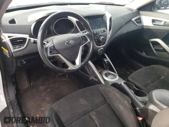 2017 Hyundai Veloster z VIN KMHTC6AD8HU310860, wystawiony jako Copart lot #42170923 z przebiegiem 97 009 mil mil oraz . Historia ofert i sprzedaży dostępna na DreamBid. Obrazek 8.