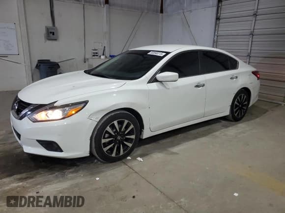 ✅ 2018 Nissan Altima SV • VIN: 1N4AL3AP7JC198011 • Лот: 90898315. Опубликован ранее на Copart с пробегом 118 419 миль. Бесплатный доступ к архиву аукционных продаж из США и подробный отчёт об истории автомобиля на DreamBid. Изображение 1.