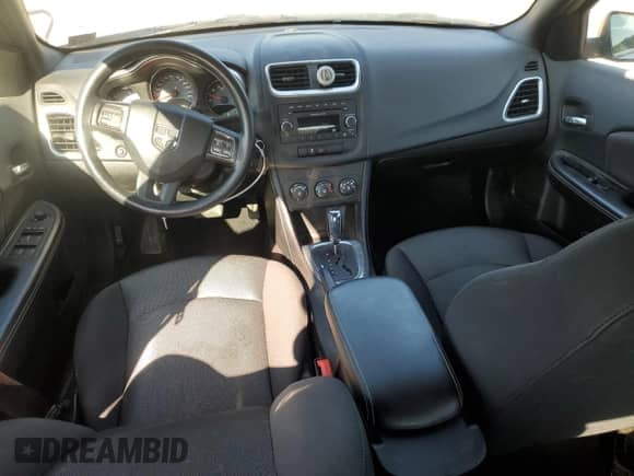 2014 Dodge Avenger SE с VIN 1C3CDZABXEN126841, выставлен на аукционе Copart как лот 70991704 с пробегом 82 550 миль миль и Списание • Salvage title. История ставок и продаж доступна на DreamBid. Изображение 8.