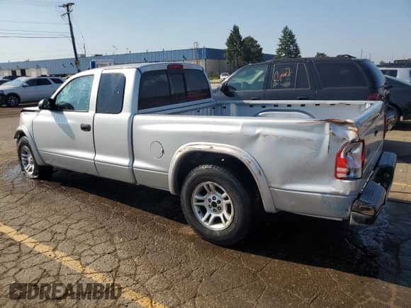2004 Dodge Dakota z VIN 1D7GL12K94S595067, wystawiony jako Copart lot #71470414 z przebiegiem 157 284 mil mil oraz Czysty tytuł • Clean title. Historia ofert i sprzedaży dostępna na DreamBid. Obrazek 2.