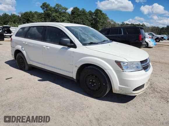 2012 Dodge Journey American Value z VIN 3C4PDCAB9CT353221, wystawiony jako Copart lot #83983955 z przebiegiem 312 681 mil mil oraz Szkoda całkowita • Salvage title. Historia ofert i sprzedaży dostępna na DreamBid. Obrazek 4.