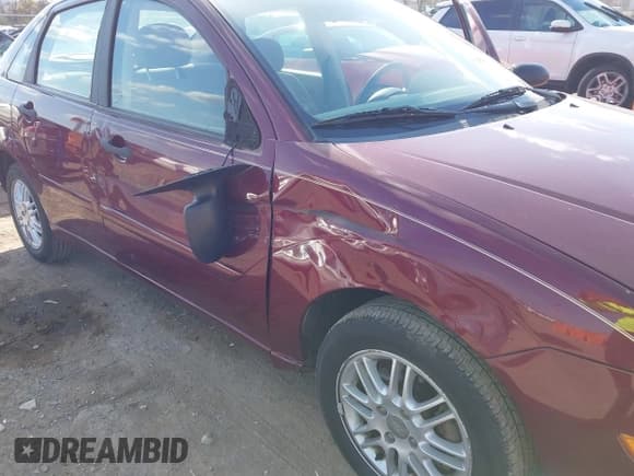 ✅ 2007 Ford Focus S • VIN: 1FAFP34N77W270952 • Lot: 43706854. Listed on IAAI with 103,039 mi. Free auction sales archive from the USA and detailed vehicle history report at DreamBid. Image 6.