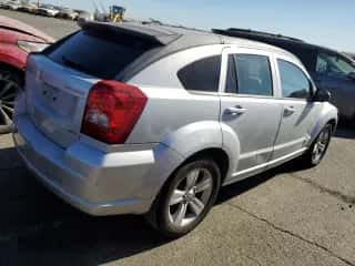2010 Dodge Caliber SXT с VIN 1B3CB4HA2AD664324, выставлен на аукционе Copart как лот 67934864 с пробегом 202 526 миль миль и Списание • Salvage title. История ставок и продаж доступна на DreamBid. Изображение 3.