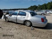 ✅ 1998 Lincoln Town Car Signature • VIN: 1LNFM82W0WY734500 • Lot: 70578805. Listed on Copart with Not provided. Free auction sales archive from the USA and detailed vehicle history report at DreamBid. Image 2.