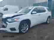 2018 Chevrolet Traverse High Country z VIN 1GNEVKKW3JJ107938, wystawiony jako IAAI lot #43356811 z przebiegiem 76 017 mil mil oraz . Historia ofert i sprzedaży dostępna na DreamBid. Obrazek 2.