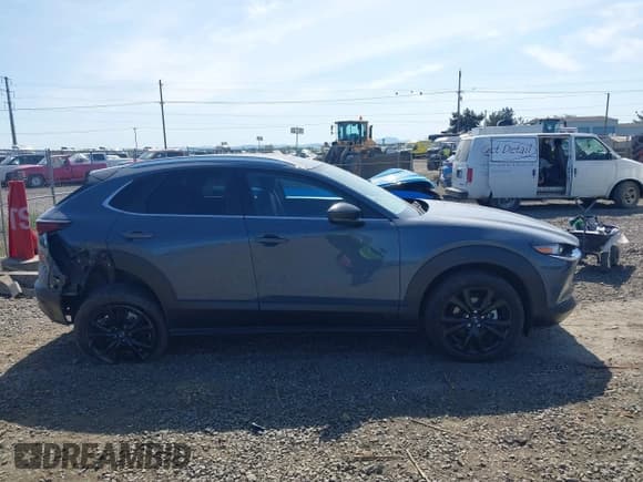 ✅ 2022 Mazda CX-30 S Carbon Edition • VIN: 3MVDMBCL8NM422737 • Lot: 42229336. Listed on IAAI with 14,665 mi. Free auction sales archive from the USA and detailed vehicle history report at DreamBid. Image 13.