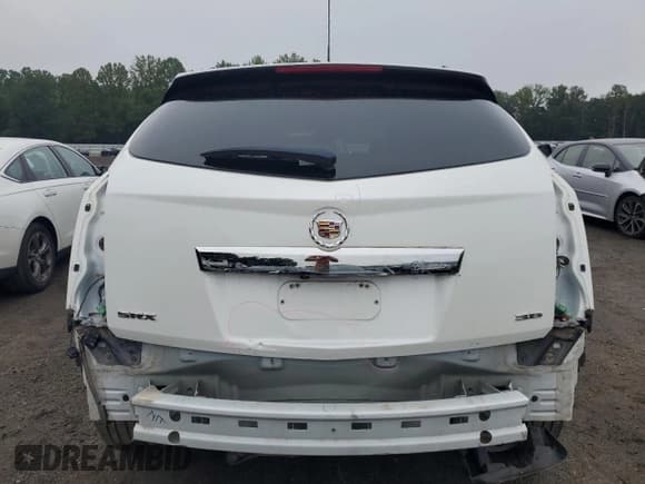 ✅ 2016 Cadillac SRX Premium Collection • VIN: 3GYFNDE34GS547419 • Lot: 69246505. Wystawiony na Copart z przebiegiem 83 142 mil. Bezpłatny archiwum sprzedaży aukcyjnych z USA i szczegółowy raport historii pojazdu na DreamBid. Zdjęcie 6.