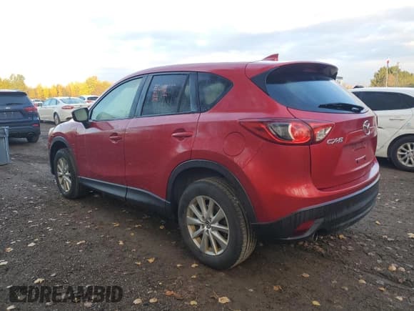 ✅ 2016 Mazda CX-5 Touring • VIN: JM3KE2CY6G0697957 • Лот: 89554065. Опубликован ранее на Copart с пробегом 237 602 миль. Бесплатный доступ к архиву аукционных продаж из США и подробный отчёт об истории автомобиля на DreamBid. Изображение 2.