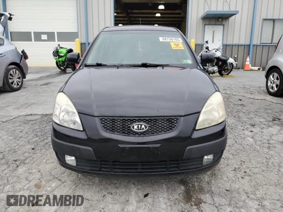 ✅ 2009 Kia Rio SX • VIN: KNADE243596471233 • Lot: 68736765. Listed on Copart with 140,498 mi. Free auction sales archive from the USA and detailed vehicle history report at DreamBid. Image 5.