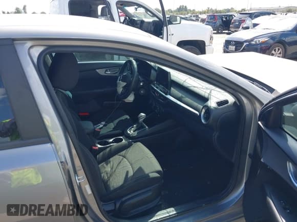 ✅ 2023 Kia Forte LXS • VIN: 3KPF24AD2PE606561 • Lot: 43400482. Listed on IAAI with 61,935 mi. Free auction sales archive from the USA and detailed vehicle history report at DreamBid. Image 5.