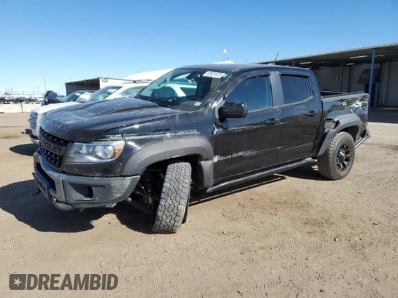 ✅ 2021 Chevrolet Colorado 4WD ZR2 • VIN: 1GCGTEEN1M1123295 • Lot: 82631875. Listed on Copart with 82,405 mi. Free auction sales archive from the USA and detailed vehicle history report at DreamBid. Image 1.