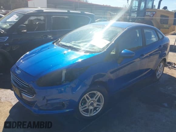 ✅ 2018 Ford Fiesta SE • VIN: 3FADP4BJ7JM143865 • Lot: 43469094. Wystawiony na IAAI z przebiegiem 90 221 mil. Bezpłatny archiwum sprzedaży aukcyjnych z USA i szczegółowy raport historii pojazdu na DreamBid. Zdjęcie 2.