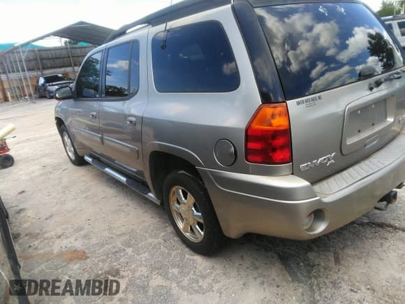 ✅ 2003 GMC Envoy SLE • VIN: 1GKES16SX36156406 • Lot: 42967652. Listed on IAAI with 264,385 mi. Free auction sales archive from the USA and detailed vehicle history report at DreamBid. Image 3.