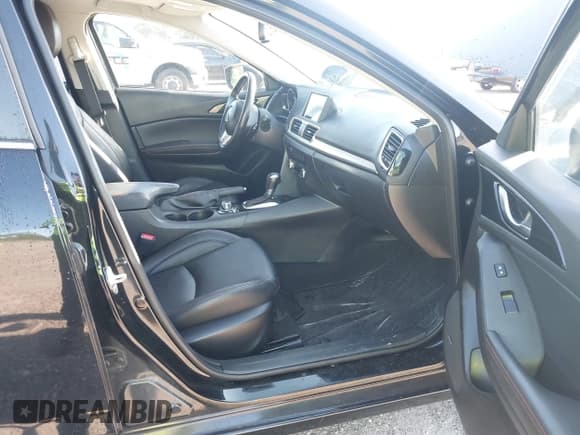 ✅ 2016 Mazda 3 S Touring • VIN: JM1BM1W37G1297731 • Lot: 42639017. Listed on IAAI with 141,650 mi. Free auction sales archive from the USA and detailed vehicle history report at DreamBid. Image 5.