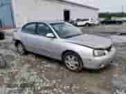 2003 Hyundai Elantra GLS with VIN KMHDN45D73U625235, listed as a Copart auction lot 62965683 with 153,845 mi miles and Salvage title. Bid and sale history available at DreamBid. Image 4.