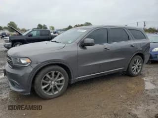 ✅ 2014 Dodge Durango R/T • VIN: 1C4SDJCTXEC509477 • Lot: 82459115. Listed on Copart with 131,889 mi. Free auction sales archive from the USA and detailed vehicle history report at DreamBid. Image 1.