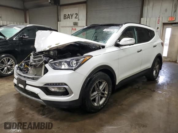 ✅ 2018 Hyundai Santa Fe 2.4L • VIN: 5NMZUDLBXJH089092 • Лот: 45015274. Опубликован ранее на Copart с пробегом 82 664 миль. Бесплатный доступ к архиву аукционных продаж из США и подробный отчёт об истории автомобиля на DreamBid. Изображение 1.