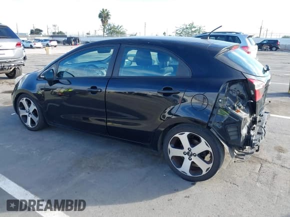 ✅ 2013 Kia Rio EX • VIN: KNADN5A31D6136842 • Lot: 43757042. Listed on IAAI with 107,054 mi. Free auction sales archive from the USA and detailed vehicle history report at DreamBid. Image 3.