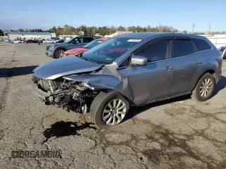 ✅ 2011 Mazda CX-7 i Sport • VIN: JM3ER2B56B0405872 • Лот: 87252225. Опубликован ранее на Copart с пробегом 103 639 миль. Бесплатный доступ к архиву аукционных продаж из США и подробный отчёт об истории автомобиля на DreamBid. Изображение 1.