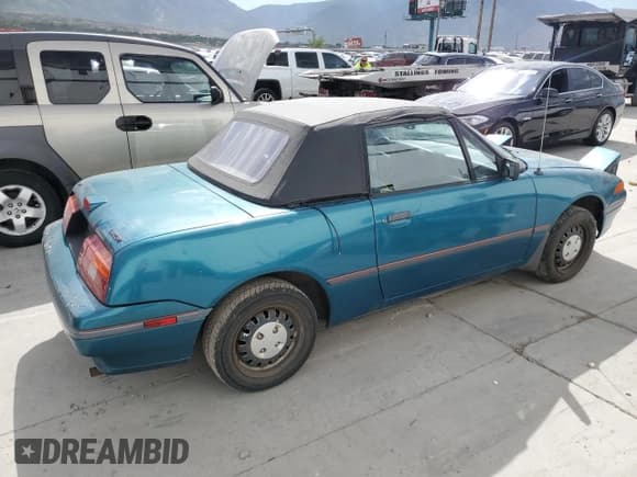 ✅ 1992 Mercury Capri • VIN: 6MPCT01Z1N8604028 • Лот: 76045794. Опубликован ранее на Copart с пробегом 719 364 миль. Бесплатный доступ к архиву аукционных продаж из США и подробный отчёт об истории автомобиля на DreamBid. Изображение 3.