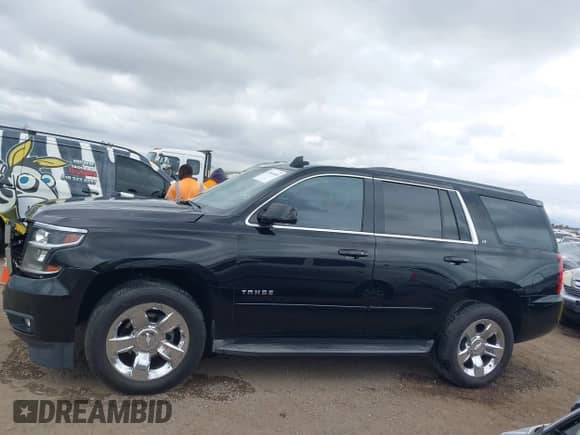 2016 Chevrolet Tahoe LT with VIN 1GNSCBKC5GR103401, listed as a IAAI auction lot 42068440 with 117,662 mi miles and . Bid and sale history available at DreamBid. Image 14.