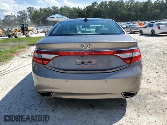 ✅ 2012 Hyundai Azera • VIN: KMHFH4JG1CA166964 • Лот: 71213125. Опубликован ранее на Copart с пробегом 181 191 миль. Бесплатный доступ к архиву аукционных продаж из США и подробный отчёт об истории автомобиля на DreamBid. Изображение 6.