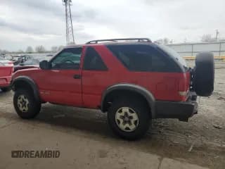 ✅ 2001 Chevrolet Blazer LS • VIN: 1GNCT18W71K247094 • Lot: 53748065. Wystawiony na Copart z przebiegiem 145 695 mil. Bezpłatny archiwum sprzedaży aukcyjnych z USA i szczegółowy raport historii pojazdu na DreamBid. Zdjęcie 2.