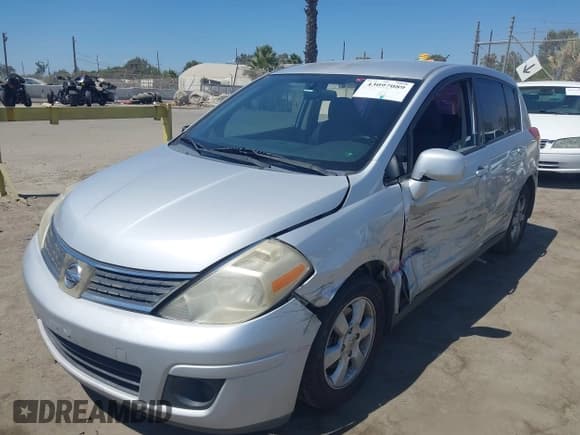 ✅ 2007 Nissan Versa S • VIN: 3N1BC13EX7L410415 • Lot: 43097089. Listed on IAAI with 132,079 mi. Free auction sales archive from the USA and detailed vehicle history report at DreamBid. Image 2.