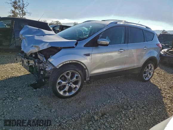 ✅ 2013 Ford Escape Titanium • VIN: 1FMCU0J97DUD18318 • Lot: 94751285. Listed on Copart with 32,589 mi. Free auction sales archive from the USA and detailed vehicle history report at DreamBid. Image 1.