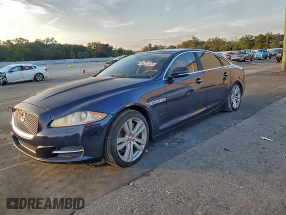 ✅ 2014 Jaguar XJ Portfolio • VIN: SAJWA2GZ0E8V71909 • Lot: 94231355. Listed on Copart with 85,232 mi. Free auction sales archive from the USA and detailed vehicle history report at DreamBid. Image 1.