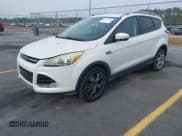 ✅ 2015 Ford Escape Titanium • VIN: 1FMCU9JX9FUC40596 • Lot: 43772085. Wystawiony na IAAI z przebiegiem 155 293 mil. Bezpłatny archiwum sprzedaży aukcyjnych z USA i szczegółowy raport historii pojazdu na DreamBid. Zdjęcie 17.