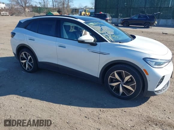 ✅ 2023 Volkswagen ID.4 Pro • VIN: 1V2VMPE82PC030464 • Лот: 41767375. Опубликован ранее на IAAI с пробегом 45 004 миль. Бесплатный доступ к архиву аукционных продаж из США и подробный отчёт об истории автомобиля на DreamBid. Изображение 1.