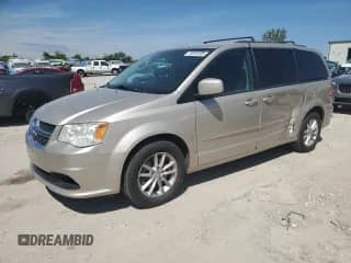 2014 Dodge Grand Caravan SXT z VIN 2C4RDGCG7ER321169, wystawiony jako Copart lot #70516105 z przebiegiem 187 876 mil mil oraz Szkoda całkowita • Salvage title. Historia ofert i sprzedaży dostępna na DreamBid. Obrazek 1.