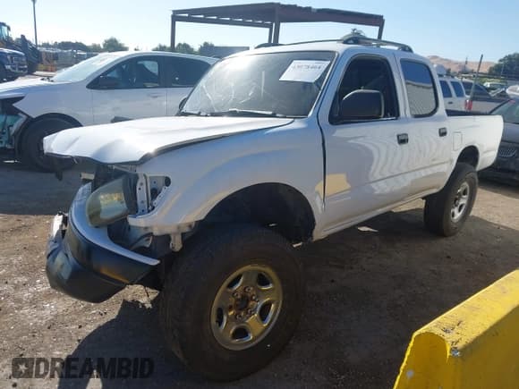 ✅ 2002 Toyota Tacoma PreRunner • VIN: 5TEGN92N12Z898950 • Lot: 43078464. Listed on IAAI with 265,021 mi. Free auction sales archive from the USA and detailed vehicle history report at DreamBid. Image 2.