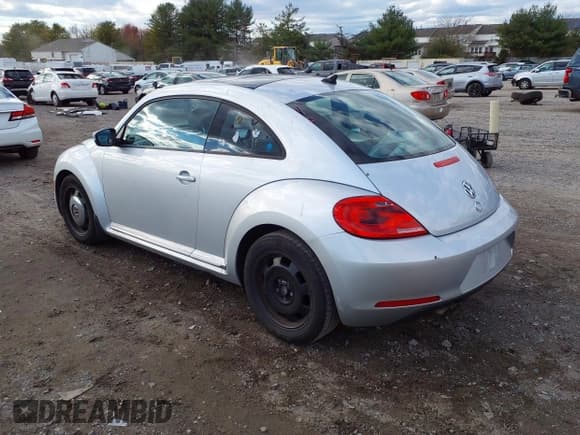 ✅ 2012 Volkswagen Beetle 2.5L PZEV • VIN: 3VWJP7AT2CM636502 • Lot: 43692083. Listed on IAAI with 103,082 mi. Free auction sales archive from the USA and detailed vehicle history report at DreamBid. Image 3.
