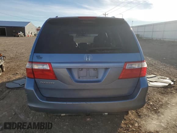 ✅ 2006 Honda Odyssey EX-L • VIN: 5FNRL38746B123750 • Лот: 90249165. Опубликован ранее на Copart с пробегом 264 175 миль. Бесплатный доступ к архиву аукционных продаж из США и подробный отчёт об истории автомобиля на DreamBid. Изображение 6.