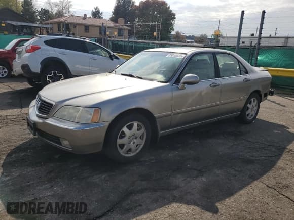 ✅ 2002 Acura RL • VIN: JH4KA96692C014405 • Лот: 85010505. Опубликован ранее на Copart с пробегом 137 692 миль. Бесплатный доступ к архиву аукционных продаж из США и подробный отчёт об истории автомобиля на DreamBid. Изображение 1.