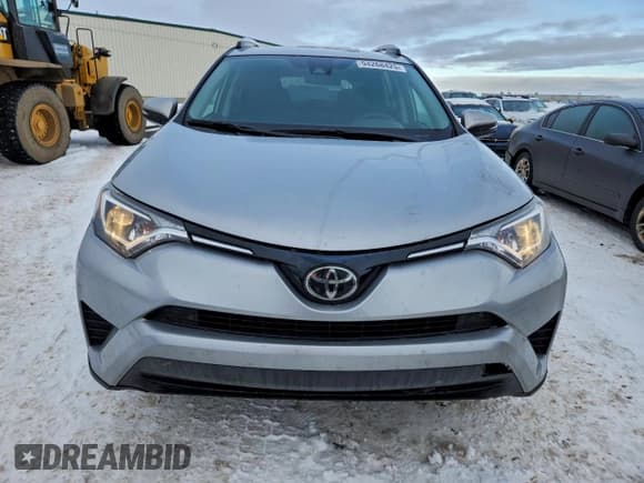 ✅ 2018 Toyota RAV4 LE • VIN: 2T3BFREV4JW802399 • Lot: 94268425. Listed on Copart with 114,198 mi. Free auction sales archive from the USA and detailed vehicle history report at DreamBid. Image 5.