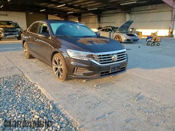 ✅ 2021 Volkswagen Passat SE • VIN: 1VWSA7A35MC000049 • Lot: 80940345. Listed on Copart with 72,920 mi. Free auction sales archive from the USA and detailed vehicle history report at DreamBid. Image 13.