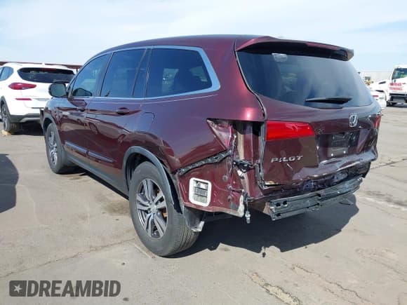 ✅ 2017 Honda Pilot EX-L • VIN: 5FNYF5H71HB027558 • Lot: 41910670. Listed on IAAI with 122,214 mi. Free auction sales archive from the USA and detailed vehicle history report at DreamBid. Image 3.