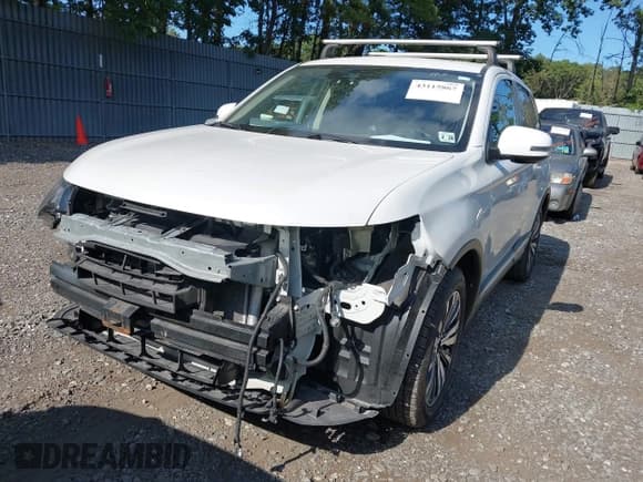 ✅ 2020 Mitsubishi Outlander ES • VIN: JA4AZ3A30LZ047219 • Lot: 43115867. Listed on IAAI with 98,689 mi. Free auction sales archive from the USA and detailed vehicle history report at DreamBid. Image 2.